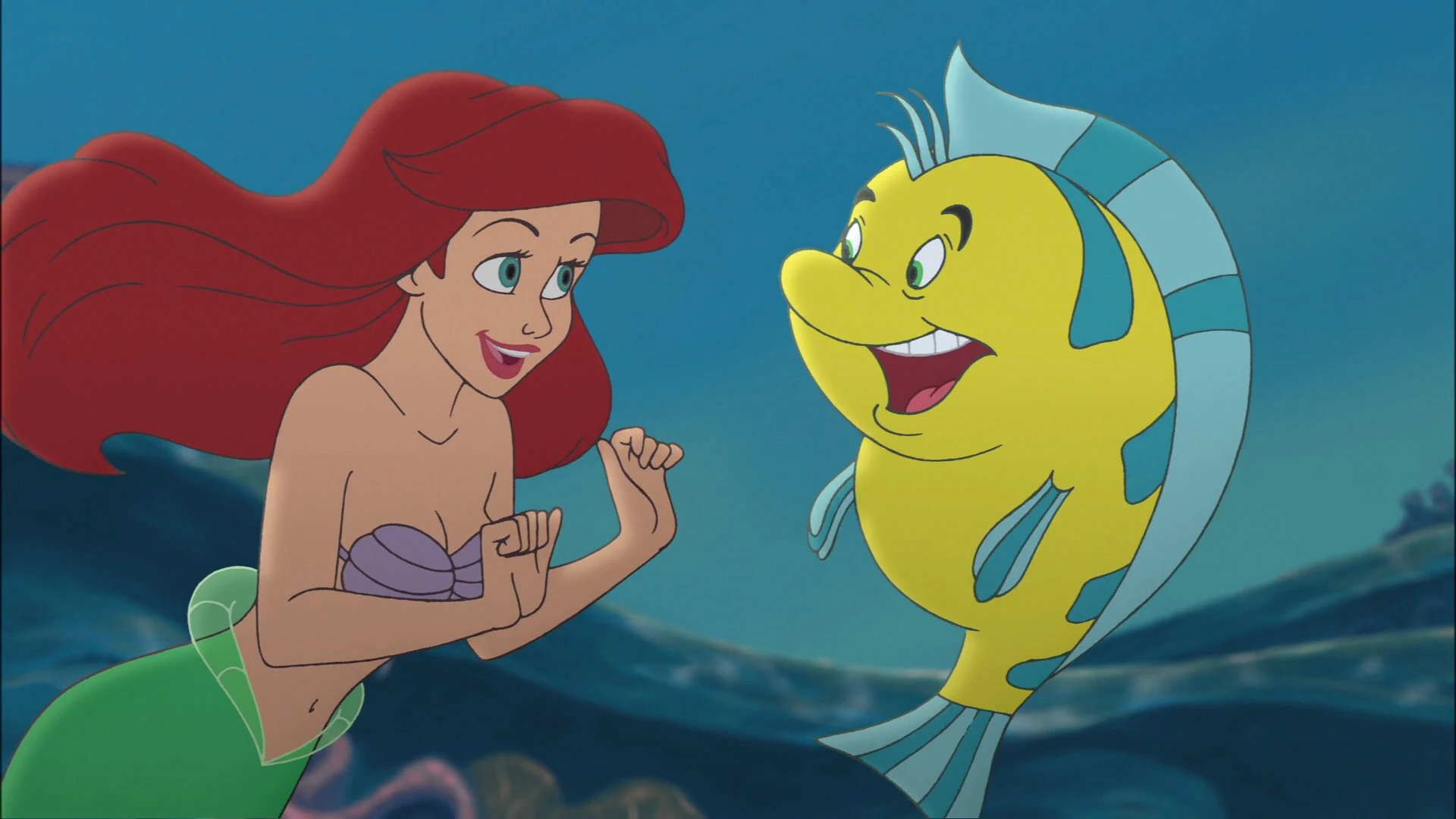 Does Ariel Call Flounder a Guppy?